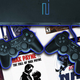 A PS2 console sitting on a spread of old PS2 game covers.